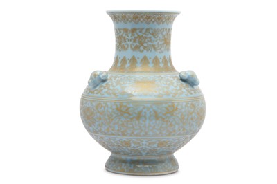 Lot 180 - A CHINESE PALE BLUE-GLAZED GILT DECORATED 'RAMS' VASE.