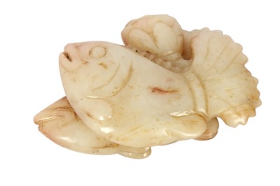 Lot 436 - A CHINESE CREAM JADE 'DOUBLE FISH' CARVING.