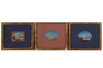 Lot 343 - THREE INDIAN OVAL MINIATURE PAINTINGS OF BUILDINGS, 19TH CENTURY
