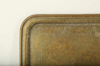 Lot 252 - A LARGE ENGRAVED BRASS TRAY WITH FIGURAL DECORATION
