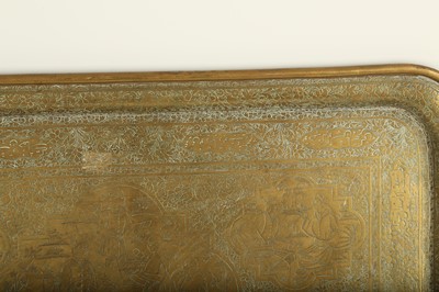 Lot 252 - A LARGE ENGRAVED BRASS TRAY WITH FIGURAL DECORATION