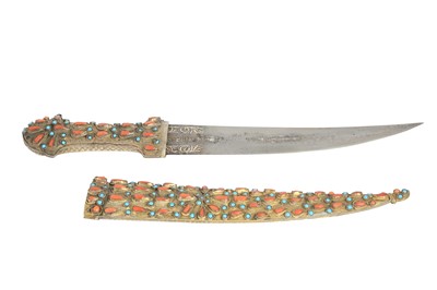 Lot 140 - AN OTTOMAN CORAL-SET DAGGER