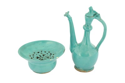 Lot 71 - A SAFAVID TURQUOISE MONOCHROME POTTERY EWER AND BASIN