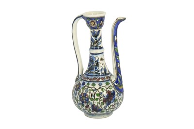 Lot 78 - A POLYCHROME-PAINTED POTTERY EWER