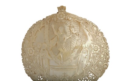 Lot 213 - λ A CARVED MOTHER-OF-PEARL SHELL PLAQUE
