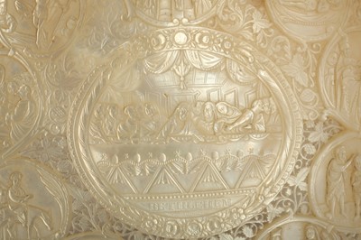 Lot 214 - λ A CARVED MOTHER-OF-PEARL SHELL PLAQUE