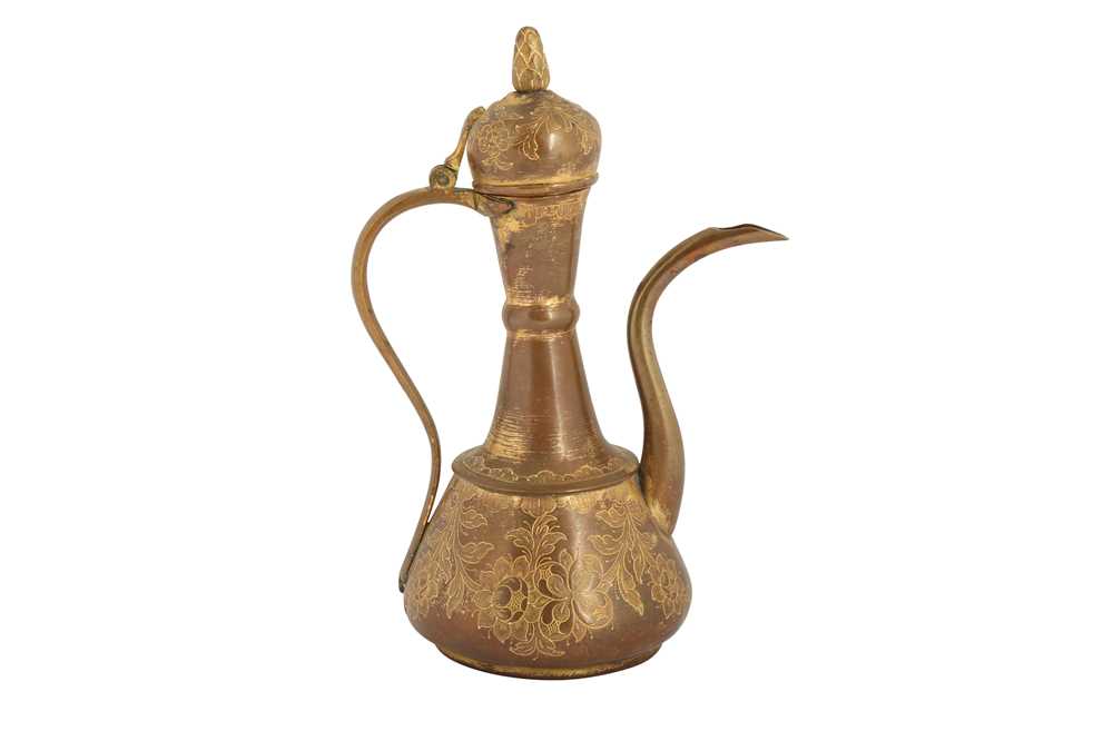 Lot 209 - AN OTTOMAN GILT-COPPER (TOMBAK) EWER