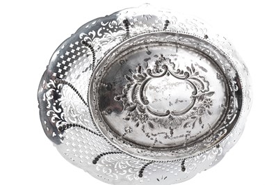 Lot 382 - A George III sterling silver cake or bread basket, London 1769 by William Plummer (reg. 8th April 1755)