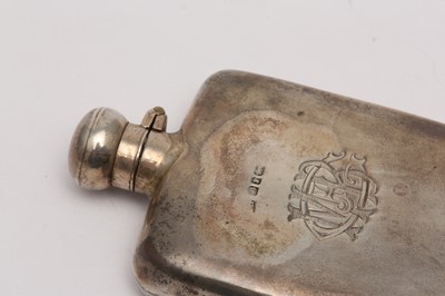 Lot 285 - A Victorian sterling silver hip or spirit flask, Birmingham 1891, makers mark obscured