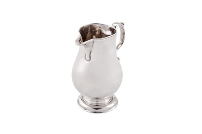 Lot 436 - A George II sterling silver ‘sparrow beak’ cream jug, London 1731 by George Greenhill Jones (reg. 19th Feb 1726)