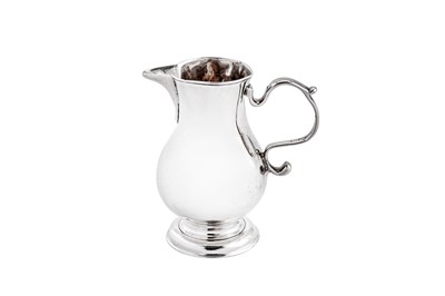 Lot 538 - A George II sterling silver ‘sparrow beak’ cream jug, London 1731 by George Greenhill Jones (reg. 19th Feb 1726)