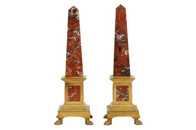 Lot 105 - A PAIR OF MID 19TH CENTURY GRAND TOUR ROUGE MARBLE AND ORMOLU MOUNTED OBELISKS
