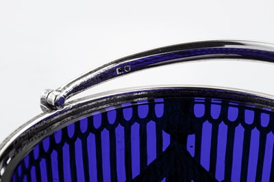 Lot 322 - An Edwardian sterling silver sugar basket, London 1907 by Carrington and Co