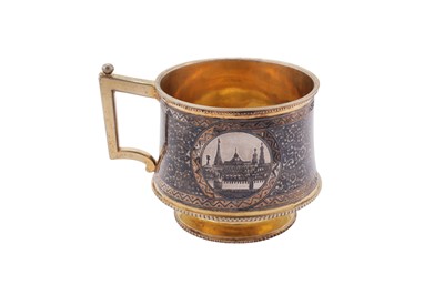 Lot 151 - An Alexander III Russian 84 zolotnik (875 standard) silver gilt and niello tea glass holder, Moscow 1883 by Vasily Semyonov (est. 1852)