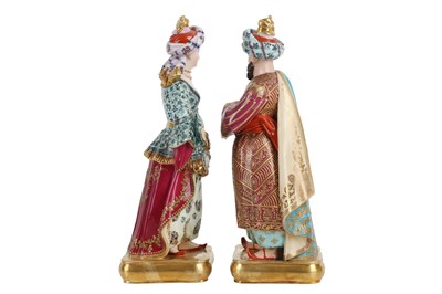 Lot 60 - A PAIR OF MID 19TH CENTURY PARIS PORCELAIN FIGURAL FLASKS OF A SULTAN AND SULTANA