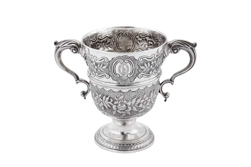 Lot 391 - Greek Ionian Islands interest - A George III Irish sterling silver twin handled cup, Dublin 1775 by Richard Tudor retailed by Matthew West