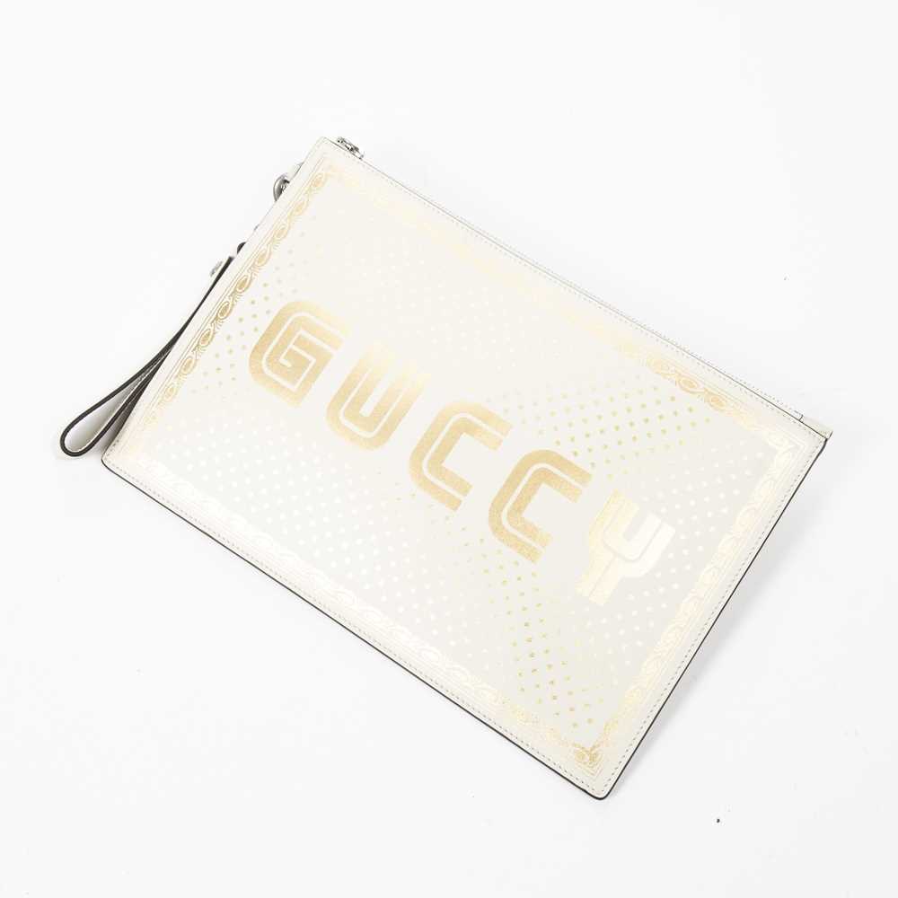 Lot 306 - Gucci Ivory Guccy Sega Clutch