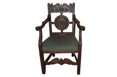 Lot 310 - A CARVED OAK OPEN ARMCHAIR, STAMPED W. HUGHES, 20TH CENTURY