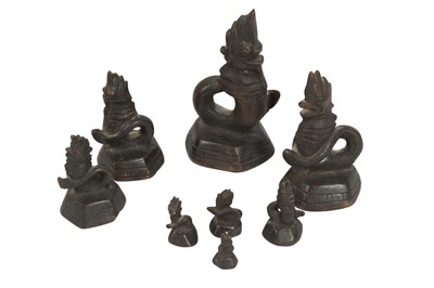 Lot 300 - A SET OF SOUTH EAST ASIAN GRADUATED BRONZE WEIGHTS