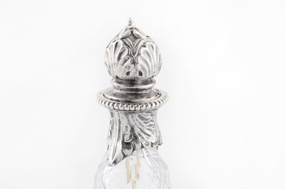 Lot 367 - A Victorian sterling silver mounted cut glass cayenne pepper bottle, London 1865 by Robert Garrard II (reg. 16th April 1818)