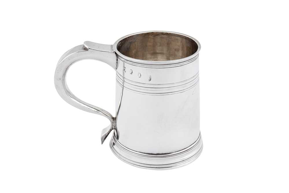 Lot 444 - A George I Britannia standard silver mug, London 1715 by Robert Peake (reg. April 1697)