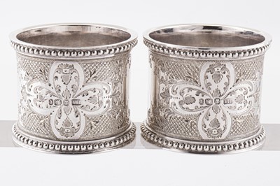 Lot 46 - A cased pair of Victorian sterling silver napkin rings, 1895 by Henry Atkin