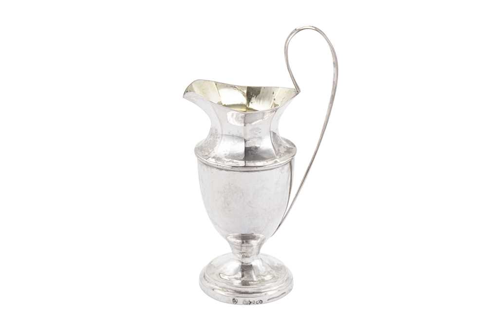 Lot 114 - An early 19th century German 12 loth (750 standard) silver milk jug, Halle (Saale) circa 1800 by M over VD (untraced)