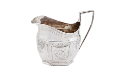 Lot 378 - A George III sterling silver milk jug, London 1800 by Duncan Urquhart & Naphtali Hart (first reg. 18th Oct 1791)