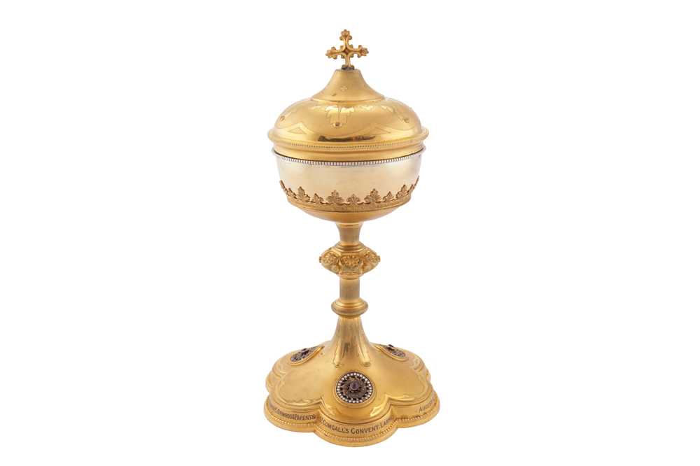 Lot 127 - An early 20th century French 950 standard silver gilt and gilt bronze chalice, Paris by Louis & Arthur Démarquet, with import marks for Dublin 1904 by C.W (untraced)