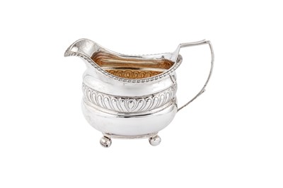 Lot 379 - A George III sterling silver milk jug, London 1816 by Thomas Paine Dexter or Thomas Death