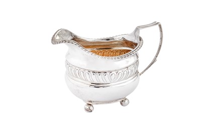 Lot 379 - A George III sterling silver milk jug, London 1816 by Thomas Paine Dexter or Thomas Death