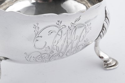 Lot 384 - A George III sterling silver sauceboat, London 1766 by James Waters (free. 24th March 1737)