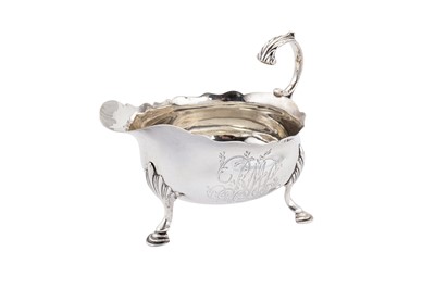 Lot 512 - A George III sterling silver sauceboat, London 1766 by James Waters (free. 24th March 1737)