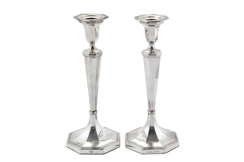 Lot 312 - A pair of George V sterling silver candlesticks, London 1910 by Asprey & Co Ltd