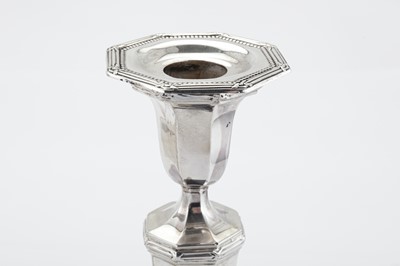 Lot 312 - A pair of George V sterling silver candlesticks, London 1910 by Asprey & Co Ltd