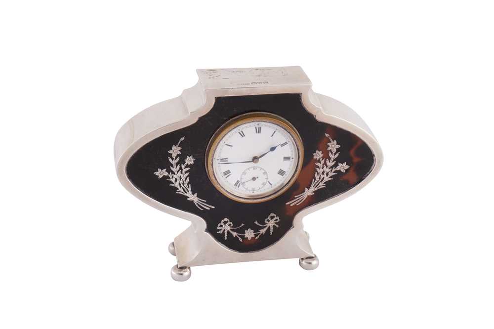 Lot 53 - A George V sterling silver and tortoiseshell desk clock, Chester 1920 by S W Goode & Co