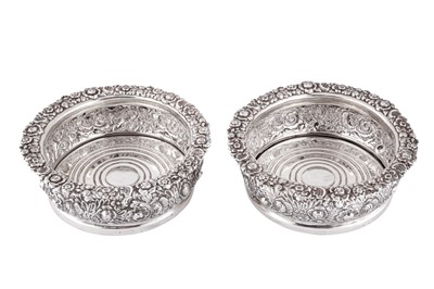 Lot 330 - A pair of Victorian sterling silver wine coasters, Sheffield 1865 by Henry Wilkinson and Co