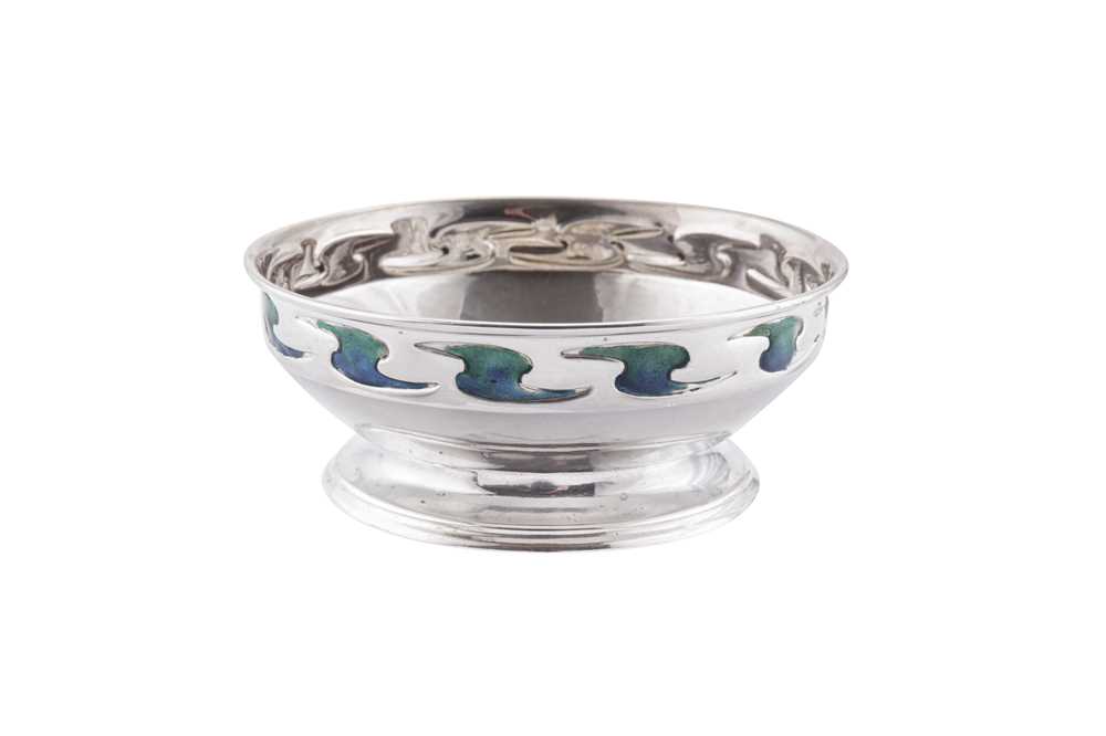 Lot 261 - An Edwardian ‘Arts and Crafts’ sterling silver and enamel bowl, London 1903 by William Hutton and Sons