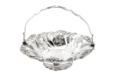 Lot 374 - Welsh interest - A William IV sterling silver cake or bread basket, London 1835 by Joseph Angell I & John Angell I