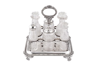 Lot 368 - A George III sterling silver eight bottle cruet, London 1819 by William Barret II