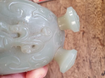 Lot 625 - A CHINESE PALE CELADON JADE ARCHAISTIC VESSEL AND COVER, GONG.