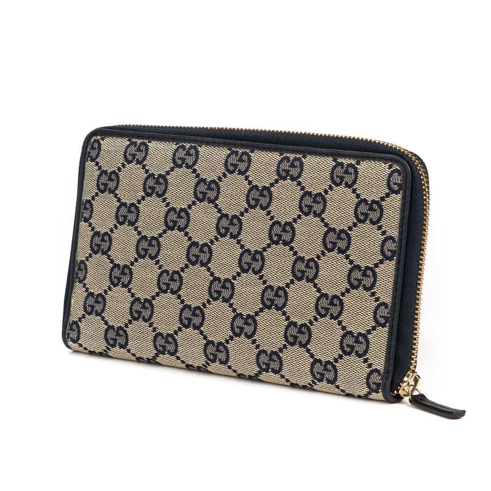 Lot 261 - Gucci Beige Monogram Zipper Card Holder