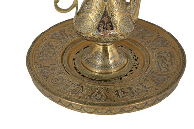 Lot 186 - A COPPER AND SILVER-INLAID 'DAMASCUS WARE' BRASS EWER AND BASIN