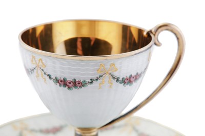 Lot 84 - An early 20th century Norwegian 930 standard silver gilt and guilloche enamel cup and saucer, Bergen circa 1910 by Marius Hammer
