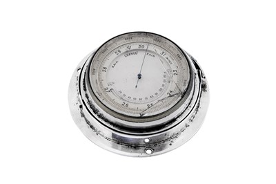 Lot 37 - An Edwardian sterling silver mounted ships barometer, London 1902 by Wright & Davies