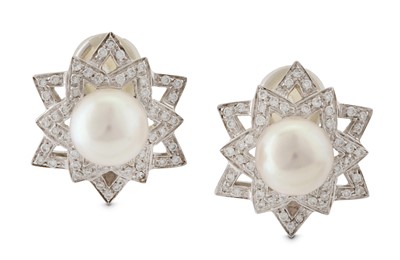 Lot 87 - A pair of cultured pearl and diamond star earclips