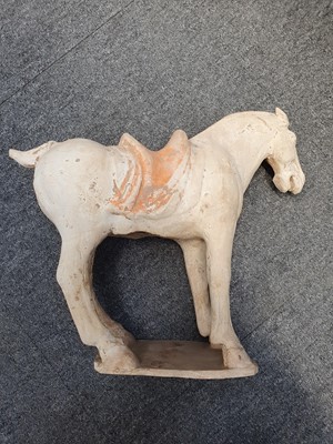 Lot 232 - A CHINESE POTTERY FIGURE OF A HORSE.
