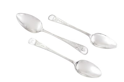 Lot 233 - Three George III sterling silver tablespoons