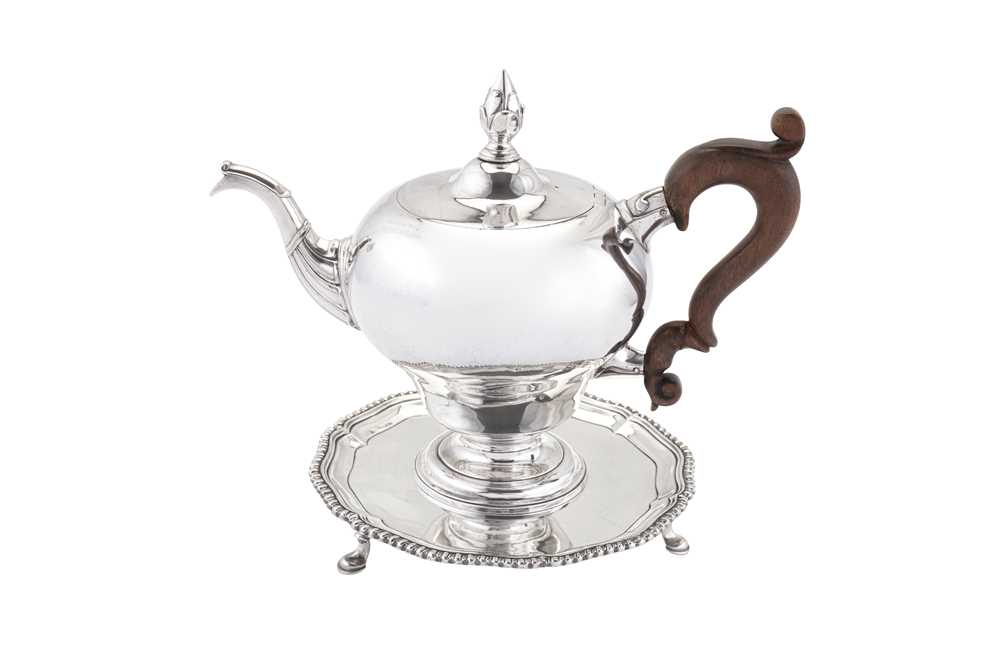 Lot 401 - A George III Scottish sterling silver teapot on stand, Edinburgh 1767 by James Welsh