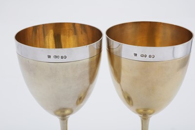 Lot 335 - A pair of large Victorian sterling silver parcel gilt goblets, London 1869 by Daniel and Charles Houle